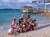 Les vacances : sujet phare de la politique sociale des CSE Politique vacances CSE : un groupe de salariés en vacances au bord d’un lagon